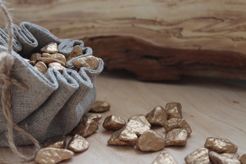 Cotton bag full of gold symbolizing richness and prosperity
