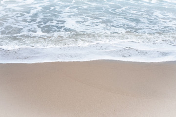 Fototapeta na wymiar The beach background,white sea wave,clear sand,beauty by nature