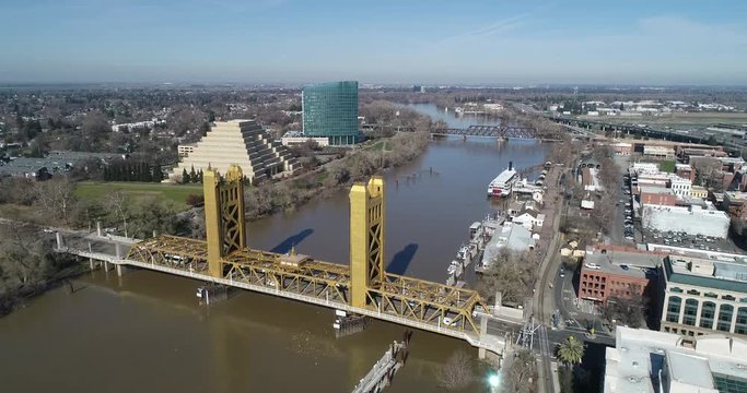 flying toward tower bridge and the ziggurat building