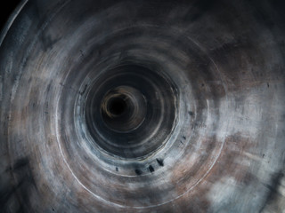 Abstract round grunge tube or pipe inside view with perspective and motion effect, empty sewer...