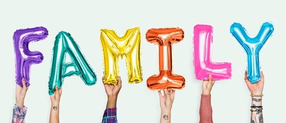 Hands showing family balloons word