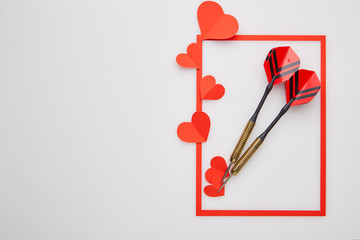 Valentine's day red darts and paper heart