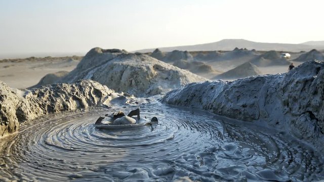 Close up shot of the mud exploding from the earth at the Mud Volcanoes in Baku, Azerbaijan