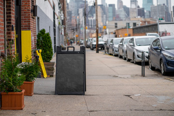 Empty Street Chalkboard Sign in Queens 