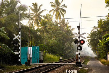 semaphore. Railway in the tropics of Sri Lanka stretching into the distance