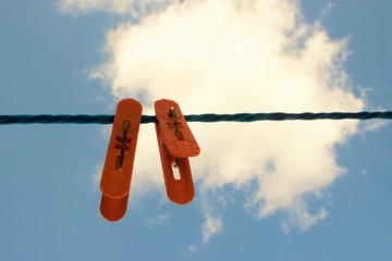 clothespin on blue sky