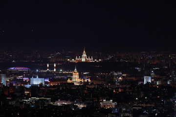 Fototapeta premium Night panorama of Moscow from Ostankinskaya tv tower with Moscow State University, Hotel Ukraine, White House, and Luzhniki stadium