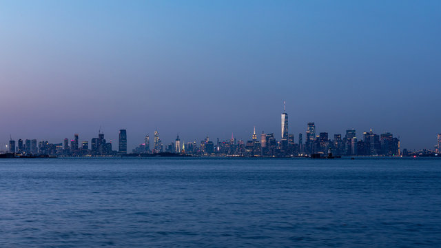 Long exposure photo of a Lower Manhattan skyline taken moments after sunset from Staten Island