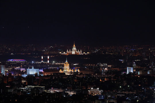Night panorama of Moscow from Ostankinskaya tv tower with Moscow State University, Hotel Ukraine, White House, and Luzhniki stadium