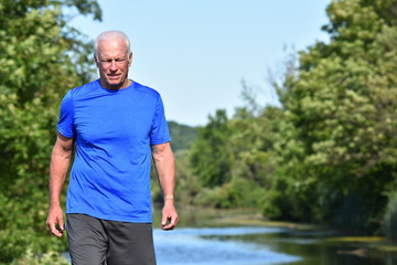 Man Walking By River