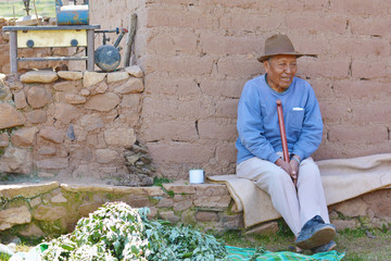 Native american old man laughing in the countryside. 