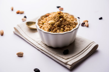 Semolina Halwa / Sooji ka Halva or sweet Rava Sheera or shira - Indian festival sweet made of semolina, nuts and Ghee