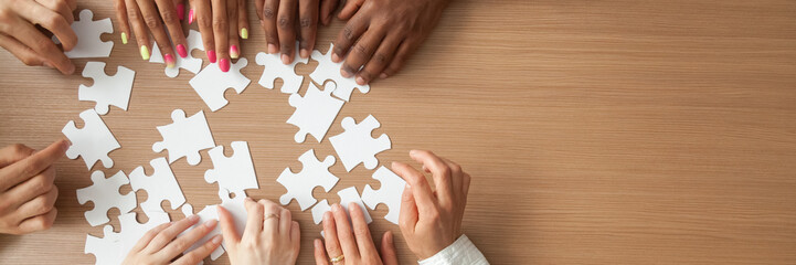 Above top panorama copyspace for text diverse hands people assemble jigsaw puzzle put pieces together search common decision. Support teamwork concept horizontal photo banner for website header design - obrazy, fototapety, plakaty