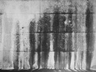 Fototapeta premium black and white cement wall background with black stain, background of dirty concrete old wall, monochrome of old wall texture