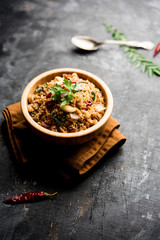 Rava Upma / Uppuma - south indian breakfast served in a bowl. selective focus