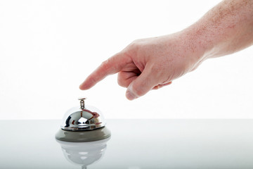 Hotel bell with one hand