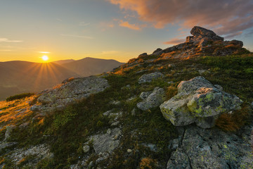 Fototapeta premium Summer landscapes of the Carpathian Mountains, with high mountain lakes and after thunderbolt rainbows.