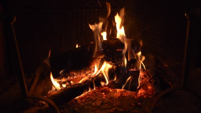 logs burning in fireplace 