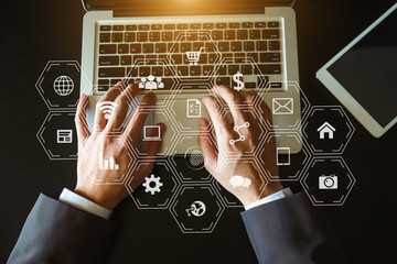 Businesswoman hand working digital marketing media in virtual screen with mobile phone and modern...