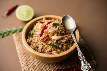 Rava Upma / Uppuma - south indian breakfast served in a bowl. selective focus