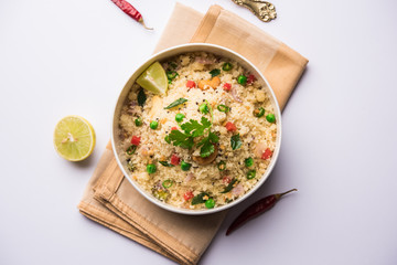 Rava Upma / Uppuma - south indian breakfast served in a bowl. selective focus