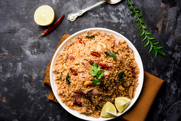 Rava Upma / Uppuma - south indian breakfast served in a bowl. selective focus