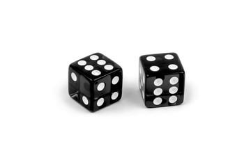 Two black glass dice isolated on white background. Six and four.