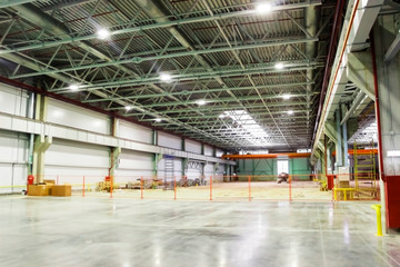 large room with concrete floor at the factory