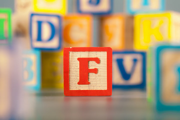 Photograph of colorful Wooden Block Letter F
