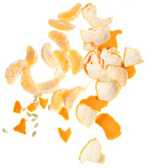 Seeds and peel in tangerines on a white background