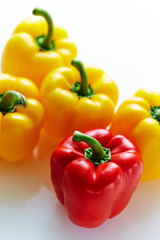 colorful bell peppers on white background