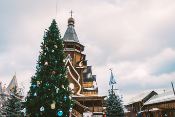 Fototapeta premium Christmas tree near the Church of St. Nicholas on the territory of the Izmailovo Kremlin in Moscow