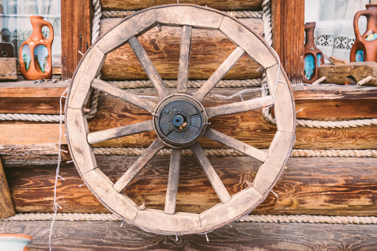 Old wooden wheels as an element of decor