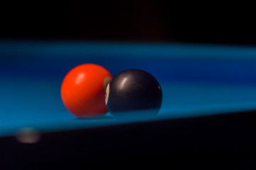 Billiard balls on pool blue table - sport background