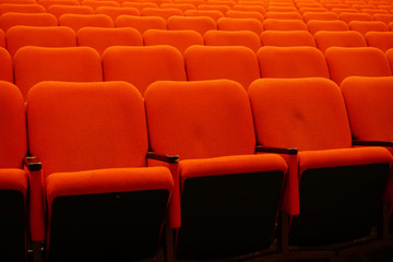 Red theater seats in a row