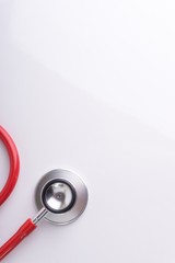 Stethoscope On White Background with selective focus and crop fragment