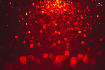 Hot and dark defocused red lights for Valentine's day background. Red bokeh and red background.