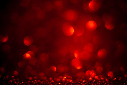 Red bokeh and red background. Valentine's day red lights defocused concept.
