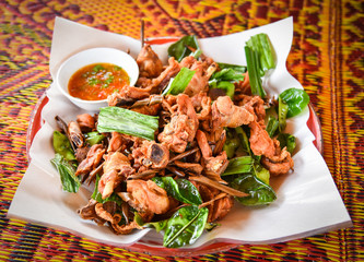 Thai fried chicken with herb / chopped chicken fried crispy with pandan galangal and lemon grass on plate