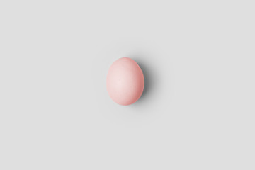 White egg on the white background in center. Design, visual art, minimalism