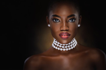 Vogue style close-up portrait of beautiful black woman