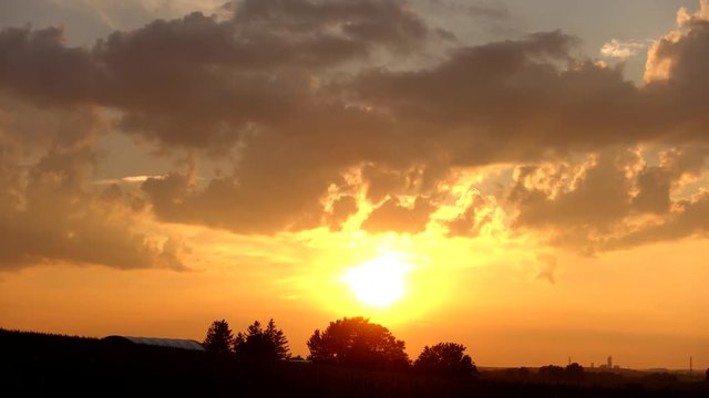 Golden Sunset Over Farm Field Timelapse