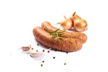 Sausage with herbs and spices on a white background