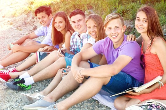portrait of group of teenagers spending time together