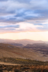Amazing sunset that lights up a beautiful canyon in Petra. Petra is a Unesco World heritage site, historical and archaeological city in southern Jordan.