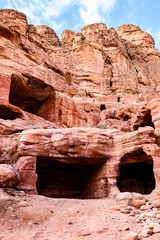 Amazing view of a rock formation with excavated caves in Petra. Petra is a Unesco World heritage site, historical and archaeological city in southern Jordan.