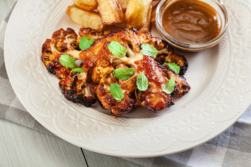 Vegetarian roasted cauliflower steak with herbs