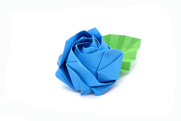Rose : Origami Blue rose with green leaf for love concepts of Valentine's day Holidays. Isolated on white background.