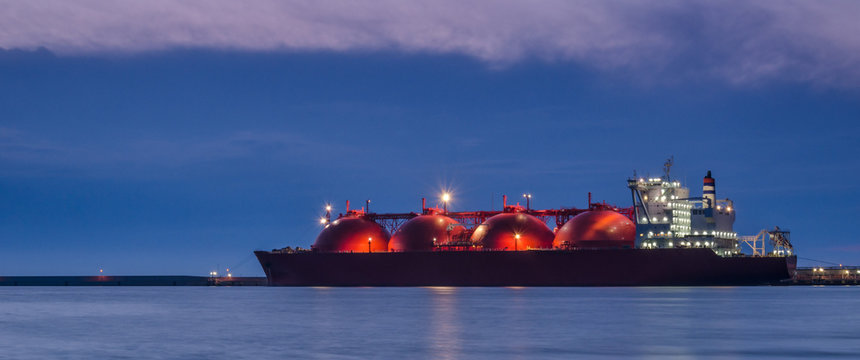 LNG TANKER - Ship at dawn moored to the gas terminal