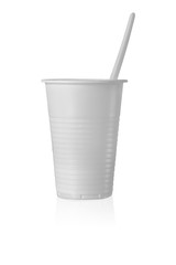 Plastic Cup with Spoon in It. Isolated on White Background.